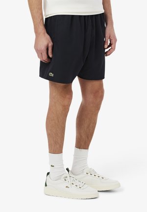 Badeshorts - noir vert