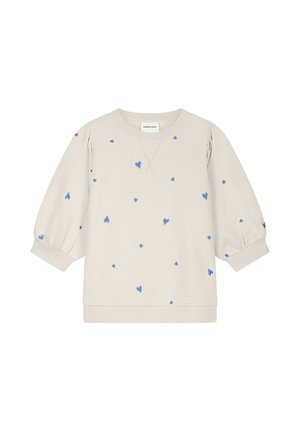 Beige sweater met lange mouwen, blauwe hartjespatronen, ronde halslijn en elastische boorden.