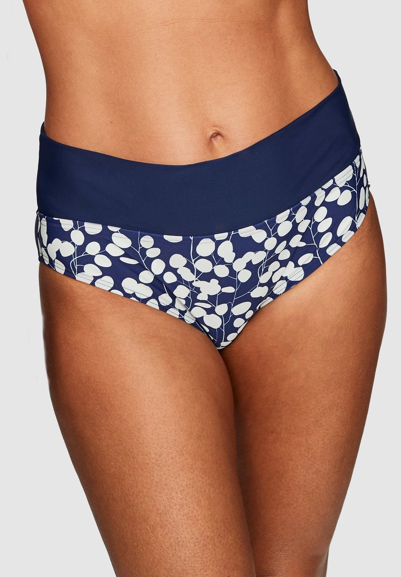 Högmidjade bikiniunderdelar i marinblått med ett vitt blommönster. Tillverkad av ett slätt material, med ett fast midjeband och sömlös design.