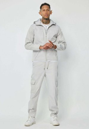 ENSEMBLE UNI AVEC CAPUCHE ET POCHES - Pantalon cargo - gris