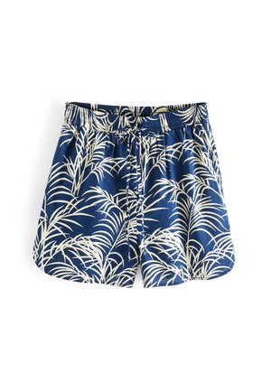 Shorts de bain bleus avec motif de feuilles de palmier tropicales blanches, taille élastique et cordon de serrage à l'avant sur un fond blanc.