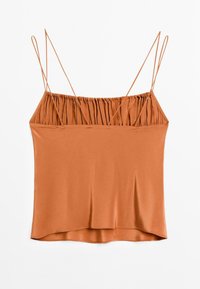 Camisole color ruggine realizzato in tessuto morbido, con sottili spalline regolabili e scollatura arricciata. Orlo dritto in fondo.