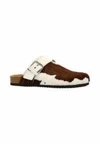 Brown and white cowhide mules with a cork sole and a silver buckle. The shoe has a rounded toe and a low-profile design.