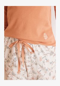 Women'secret – Pyjama Mit Reverskragen In Rosa Kariert Mit SpongeBob Und Patrick Motiv Women'secret – Pyjama Mit Reverskragen In Rosa Kariert Mit SpongeBob Und Patrick Motiv