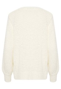 Pull tricoté écru avec manches longues bouffantes et poignets et ourlet côtelés, vu de dos.