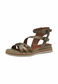 Sandal in verde oliva con più cinturini, dettagli testurizzati, una soletta imbottita e una suola bassa a strati. Fibbia regolabile alla caviglia per una vestibilità ottimale.
