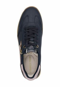 Navy leather sneaker with textured surface, stitched design, and gold hardware. Features laces and a side zip for easy access. Rubber sole.