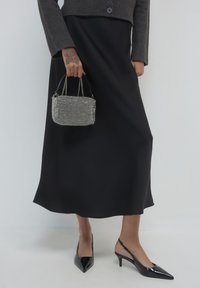 Calliope STRASS  - Pochette - nero