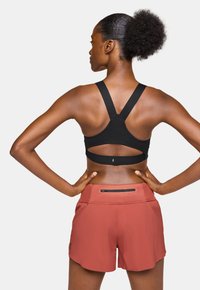 On PERFORMANCE FLEX  - Medium support sports bra - black