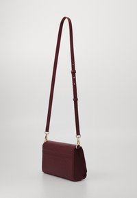 Tommy Hilfiger ETERNITY SHOULDER BAG MONO - Borsa a mano - raspberry truffle
