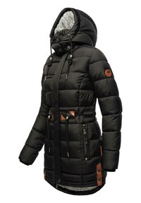 Black puffer jacket with a fur-lined hood, waist drawstring, quilted texture, leather accents, and zippered pockets.