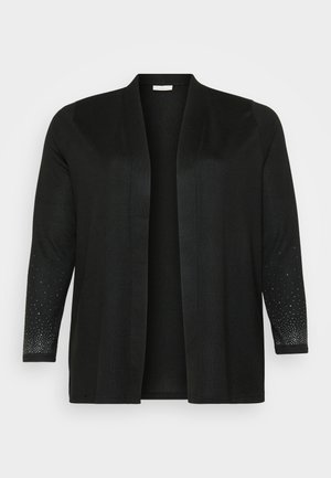 Black cardigan made of soft fabric, featuring an open front, three-quarter sleeves, and contrast embellishments with small, shiny dots on sleeves.
