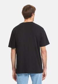 Spyder BUG LOGO - Camiseta básica - black