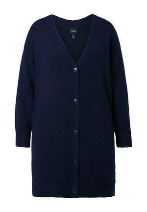 Cardigan bleu marine en tissu doux et texturé. Présente un col en V, des manches longues et cinq boutons sur le devant.