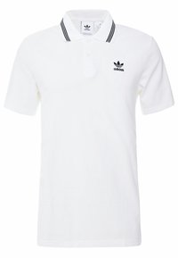Vit Adidas polo t-shirt med svartrandig krage och liten svart Adidas-logga på vänster bröst.