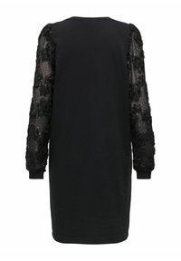 Robe noire longueur genoux avec un corps uni et des manches longues transparentes ornées d'appliqués floraux et de sequins.