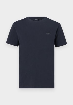 T-shirt di cotone blu navy con collo a giro, maniche corte e un piccolo logo a marchio grigio sul lato sinistro del petto. Texture liscia.