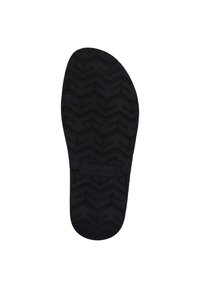 Black rubber shoe sole features a zigzag tread pattern and a rectangular logo detail; smooth edges and rounded toe area.