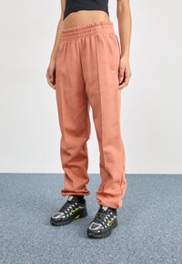 Nike Sportswear Träningsbyxor - beige