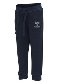 Navyblaue Sweatpants aus Waffelstruktur mit elastischem Bündchen und Kordelzug. Mit gerippten Bündchen und kleinem Logo vorne.