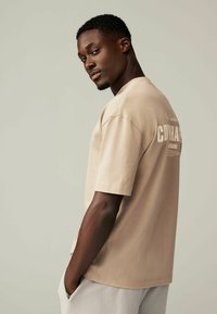 Next Camiseta estampada - stone copenhagen