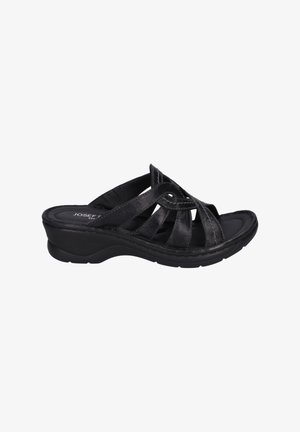 Black sandal with crisscross straps, cushioned insole, low wedge heel, and textured upper. Flexible outsole for comfort and support.