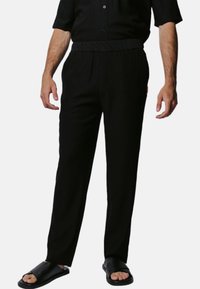 Justin Cassin ABADE  - Broek - black