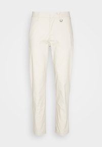 Pantaloni in cotone color crema con design a gamba dritta, dotati di chiusura con bottone e asola, e piega stirata davanti.
