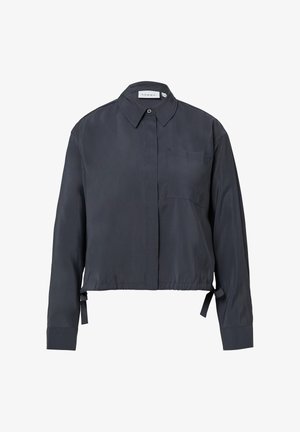 Dunkelgrau gekürztes Hemd mit Knopfleiste aus glattem Stoff, ausgestattet mit einer Brusttasche, verstellbaren seitlichen Bändern und langen Ärmeln mit geknöpften Manschetten.