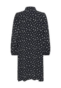 Mørkeblå kjole med et blomsterprint i hvid. Ærmerne er lange og puffede, med en krave og afslappet pasform for komfort.