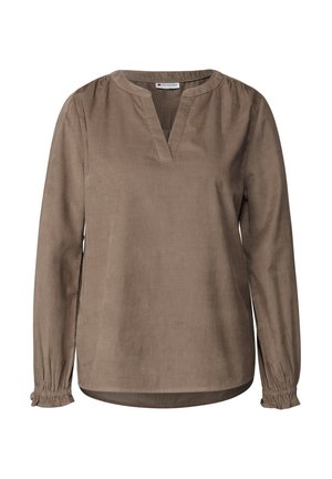 Ruskearuosteen pitkähiha blouse kevyestä kankaasta V-pääntiellä, kootut yksityiskohdat hihansuissa ja rento istuvuus pyöristettyine helmoineen.