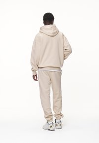 Pegador LOGO OVERSIZED JACKET - Zip-up sweatshirt - washed desert sand/black gum