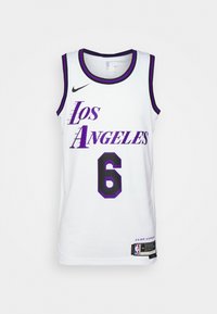 Maglia da basket bianca con la scritta "Los Angeles" in caratteri viola e il numero "6" con un contorno viola spesso. Logo Nike sul petto.