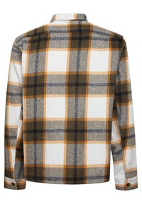 Plaid flannel shirt in white, gray, brown, and orange. Features a button-down collar, long sleeves, and a relaxed fit. Soft texture.