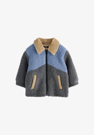 Faux-Fur-Jacke mit Reißverschluss. Texturiert in Blau, Grau und Beige. Verfügt über einen Kragen und zwei kleine Fronttaschen.