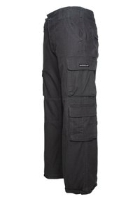 Black cargo pants made of durable fabric featuring multiple side pockets, straight cut, and elastic cuffs at the ankles.