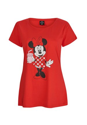 T-shirt rouge à manches courtes en coton, avec un graphique d'un personnage de dessin animé tenant une boisson. Le design comprend des pois et un nœud.