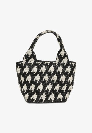 Kabelka s korálky s černo-bílým vzorem psa zubatého, zaoblenými uchy a strukturovaným povrchem. Kompaktní tvar s otevřeným vrchním designem.