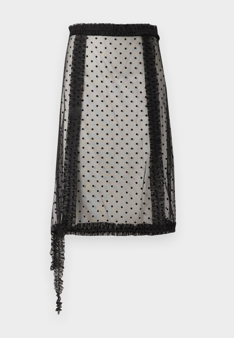 Jupe noire transparente avec motif à pois, bordure à volants et design asymétrique avec un côté plus long, fabriquée en tissu léger.