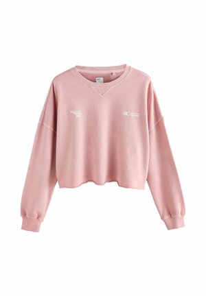 Helles rosa, kurzes Sweatshirt mit langen Ärmeln, weiter Ausschnitt und weißen Drucktext. Weiche Textur und lockere Passform.