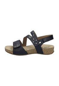 Zwarte leren sandalen met geperforeerde accenten, verstelbare banden, kurken voetbed en een getextureerde rubberen zool. Bevat een lage sleehak.