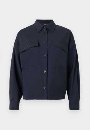 Dark navy button-up shirt with long sleeves, pointed collar, and two front flap pockets with buttons.