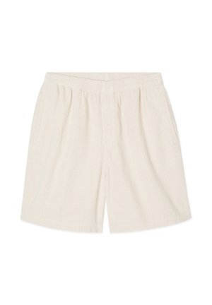 Krēmkrāsas kordura šorti ar elastīgu jostasvietu un sānu kabatām, ērts un vaļīgs piegriezums.