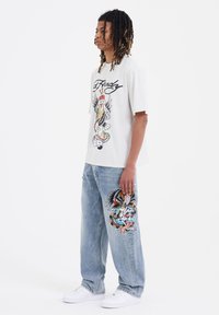 Ed Hardy SKULL SNAKE EAGLE TATTOO GRAPHIC - Jeansy Relaxed Fit