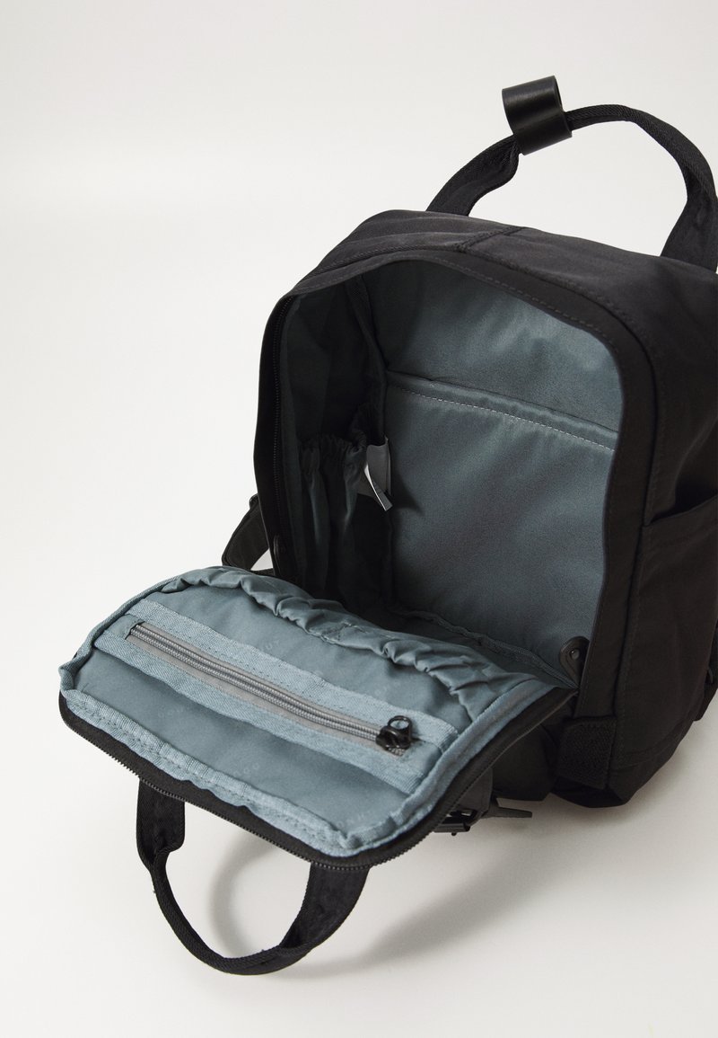 doughnut backpack mini black Macaroon Series Black Official the Macaroon Mini is both stylish and water Donut Backpack - Small |