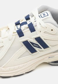 New Balance 1906 UNISEX beżowy
