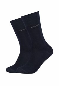 Calze in cotone blu navy con una texture liscia, bordo a costine e un logo discreto sulla caviglia. Lunghezza classica e forma aderente.