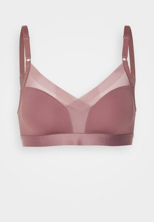 Mauve bralette with a smooth fabric base and sheer overlay. Adjustable straps and a wide underband provide support. No underwire design.