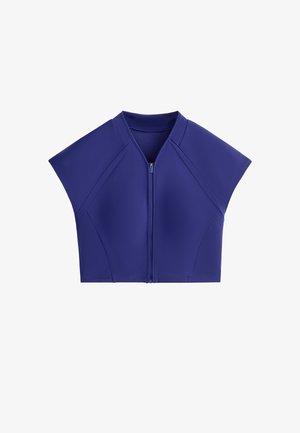 Jachetă scurtă cu mâneci scurte, albastru cobalt, cu fermoar, guler în V și detalii structurale ale cusăturilor pe un fundal alb.