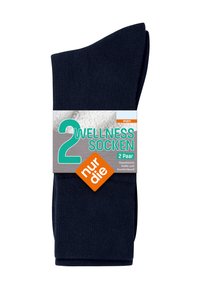To par mørkeblå wellness-strømper til mænd med polstrede såler og komfortable manchetter, pakket med en etiket på tysk.